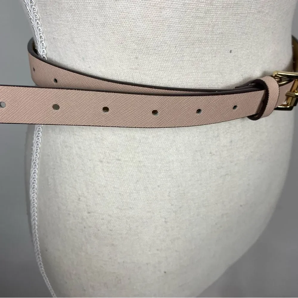 Michael Kors slim pink leather belt with a gold-tone pin buckle.